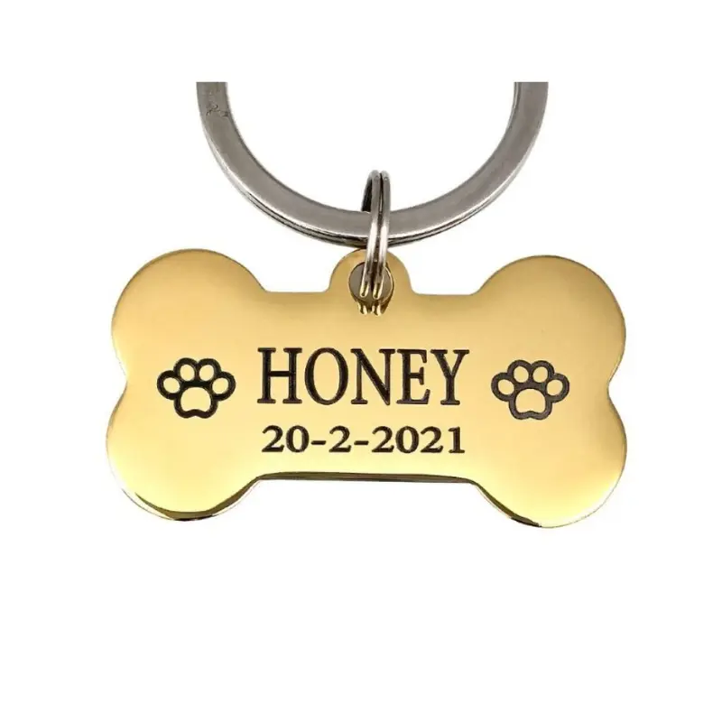 Hondenpenning met naam adres en telefoonnummer leuke hondenpenning Bot laten graveren goud